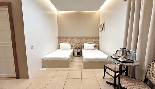 Habitación superior con 1 cama doble o 2 individuales