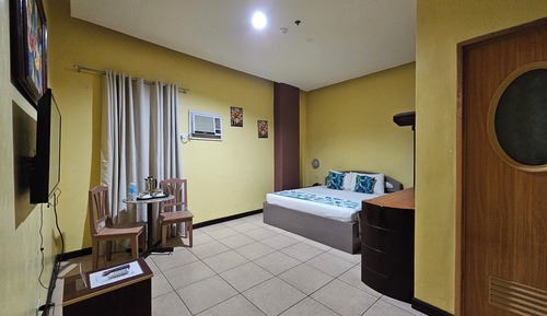 Habitación superior con 1 cama doble o 2 individuales (Grand)