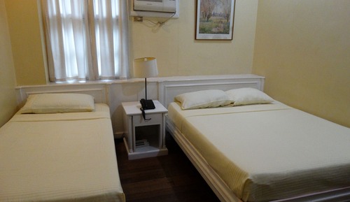 Habitación cuádruple Deluxe, varias camas
