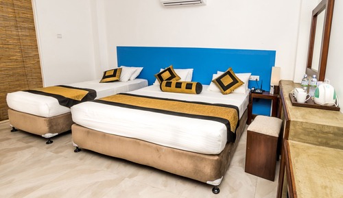 Habitación triple Deluxe