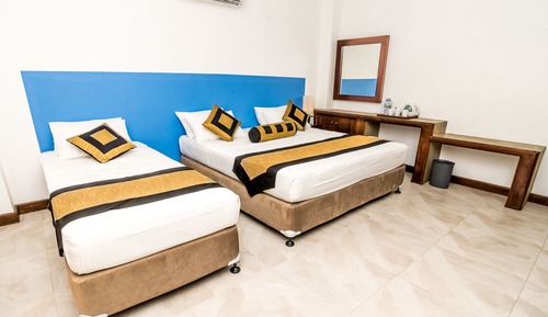 Habitación cuádruple Deluxe
