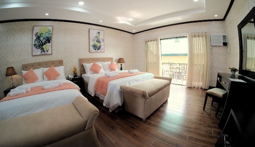 Habitación cuádruple Deluxe, varias camas