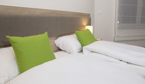 Habitación superior con 1 cama doble o 2 individuales