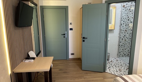 Habitación triple, vistas al jardín