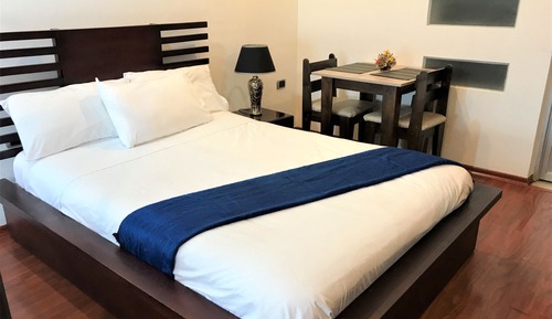 Habitación cuádruple de lujo, varias camas, baño privado