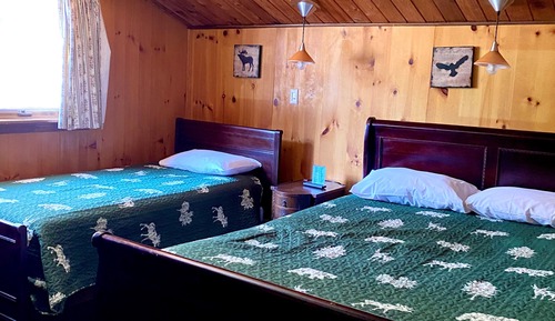 Habitación, varias camas