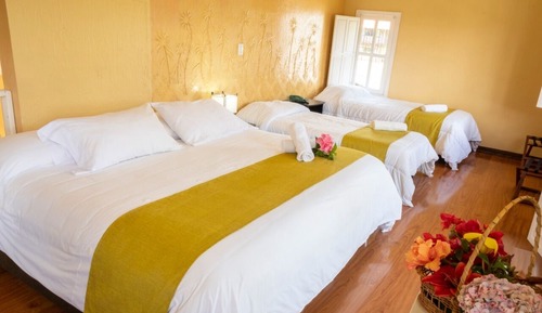 Habitación triple de lujo, 1 habitación, vistas al jardín