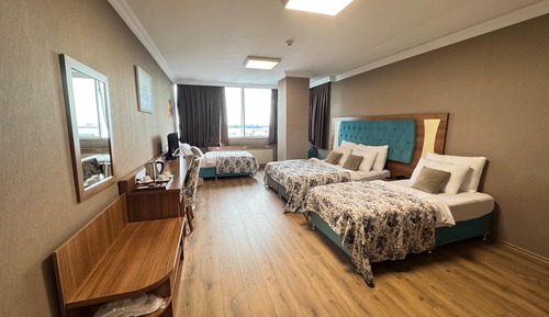 Habitación cuádruple Deluxe