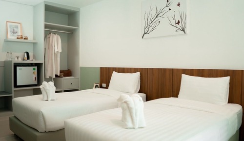 Habitación superior con 1 cama doble o 2 individuales