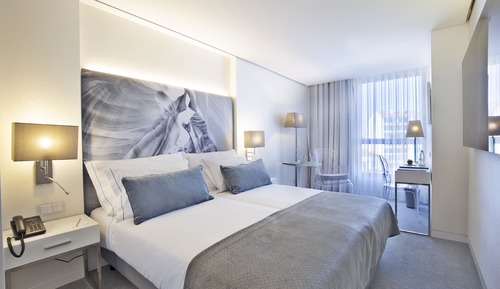 Habitación superior con 1 cama doble o 2 individuales