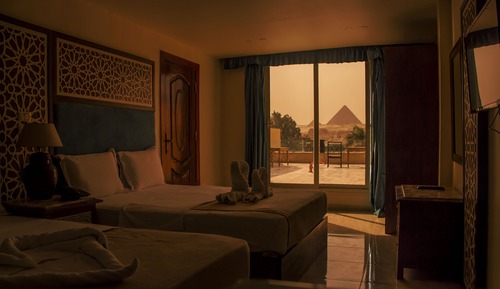 Deluxe Quadruple Room - Balcony Pyramids View