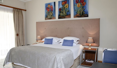 Habitación familiar, varias camas, no fumadores, vistas al jardín