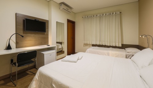 Habitación triple superior, varias camas