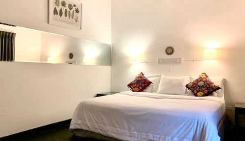 Habitación superior, 1 cama de matrimonio, vistas al jardín