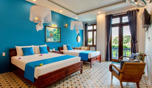 Habitación triple Deluxe, balcón