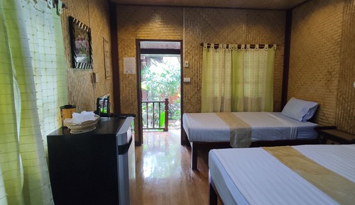 Habitación triple, balcón, en la zona del jardín