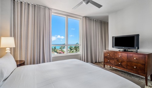 1 Bedroom Luxury Suite, 1 King, Sofa Bed, Ocean View, Balcony