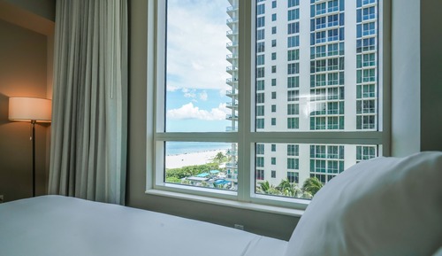 Premium, 2 Bedroom Suite, Bedroom 1: 1 King, Bedroom 2: 2 Double, Baths: 2, Ocean view, Balcony
