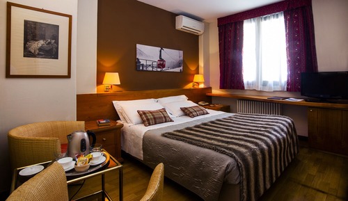 Habitación estándar con 1 cama doble o 2 individuales