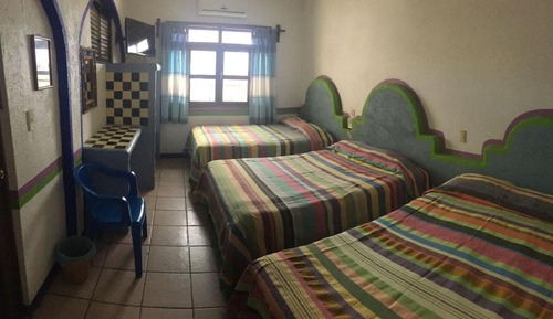 Habitación familiar, varias camas
