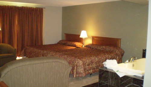 Suite estándar, varias camas, bañera de hidromasaje