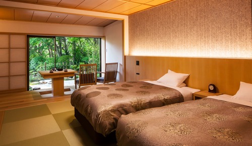 Habitación de lujo con 2 camas individuales, 2 camas dobles, vistas al jardín