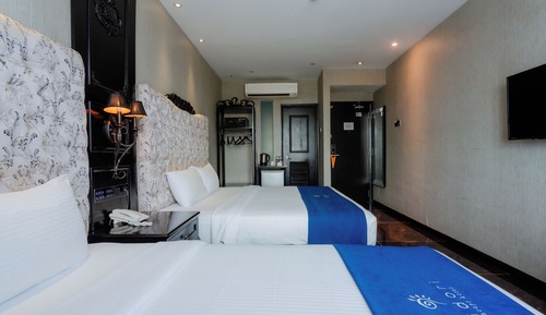 Habitación triple Deluxe