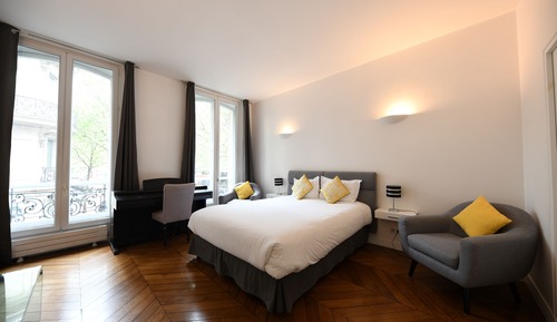 Suite ejecutiva, varias camas