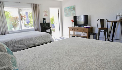 Suite junior, 2 camas dobles, en la zona del patio