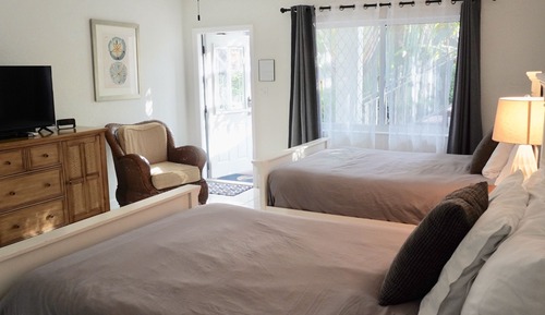 Suite junior, 2 camas dobles, cocina, en la zona del patio