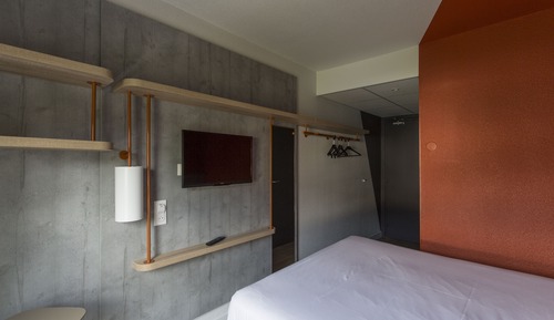 Habitación triple, varias camas