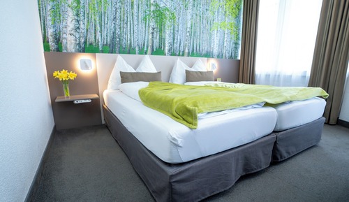 Habitación de diseño con 2 camas individuales