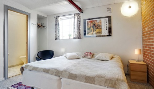 Habitación Business con 1 cama doble o 2 individuales, baño privado