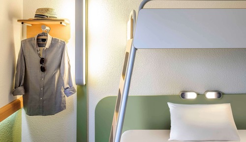 Habitación triple, varias camas