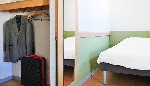 Habitación triple, varias camas