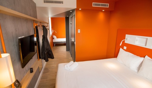 Habitación triple, varias camas