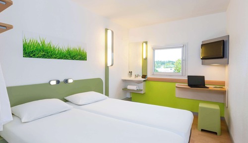 Habitación triple, varias camas