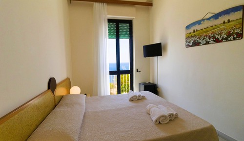 Habitación cuádruple estándar, 2 habitaciones, vistas al mar, frente al mar