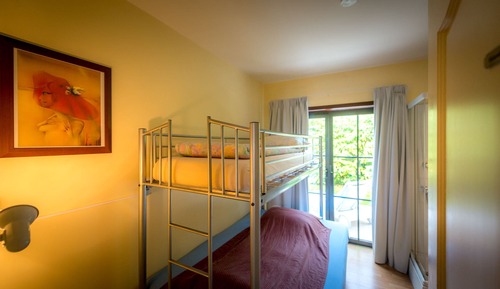 Habitación junior con 1 cama doble o 2 individuales