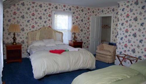 Habitación, varias camas