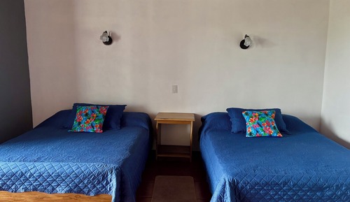 Habitación cuádruple estándar, 2 camas dobles, balcón, vistas al jardín