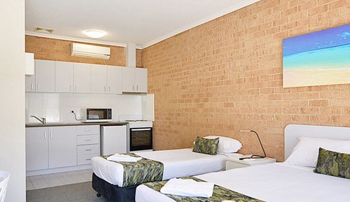 Habitación cuádruple Deluxe, varias camas