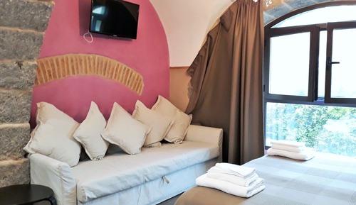Habitación triple Deluxe, 1 habitación, vistas al jardín