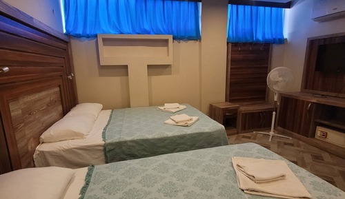 Habitación triple económica
