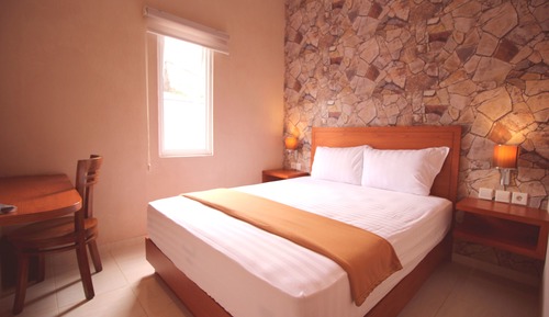 Habitación estándar con 1 cama doble o 2 individuales, no fumadores