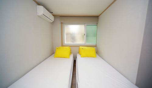 Habitación con 2 camas individuales
