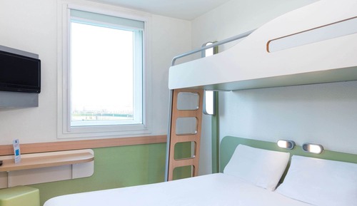 Habitación triple, varias camas