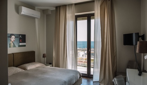 Habitación panorámica con 1 cama doble o 2 individuales, vistas al mar
