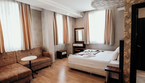 Habitación cuádruple Deluxe