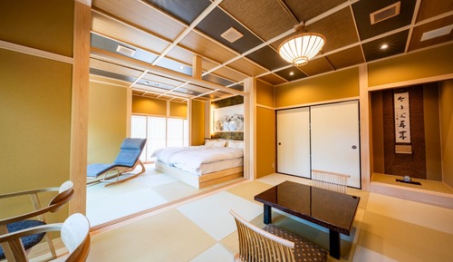 Suite junior, bañera, vistas al jardín